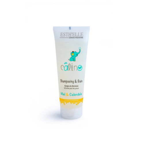 Shampooing et gel bain Esthelle Calino, flacon de 250 ml, formule douce enrichie en calendula et miel pour nettoyer et protéger la peau et les cheveux délicats des bébés.